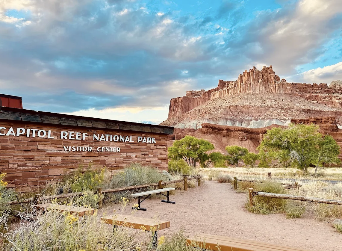 The Capitol Reef National Park Visitor Center building under a clear blue sky